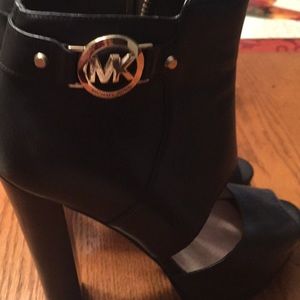 Black Michael Kors boots.